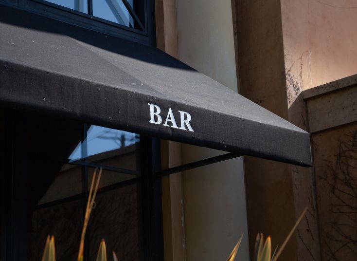 Custom retractable awnings installed in London, providing stylish outdoor shade and protection with durable, weather-resistant materials